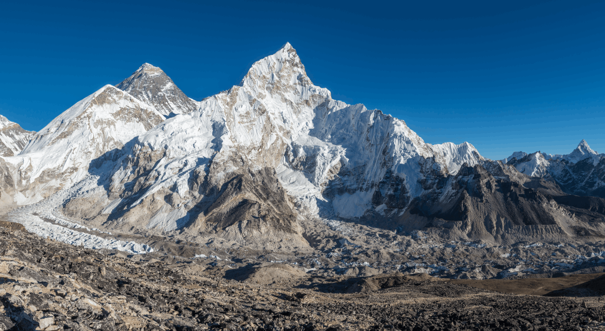 Couple pointing to himalayas